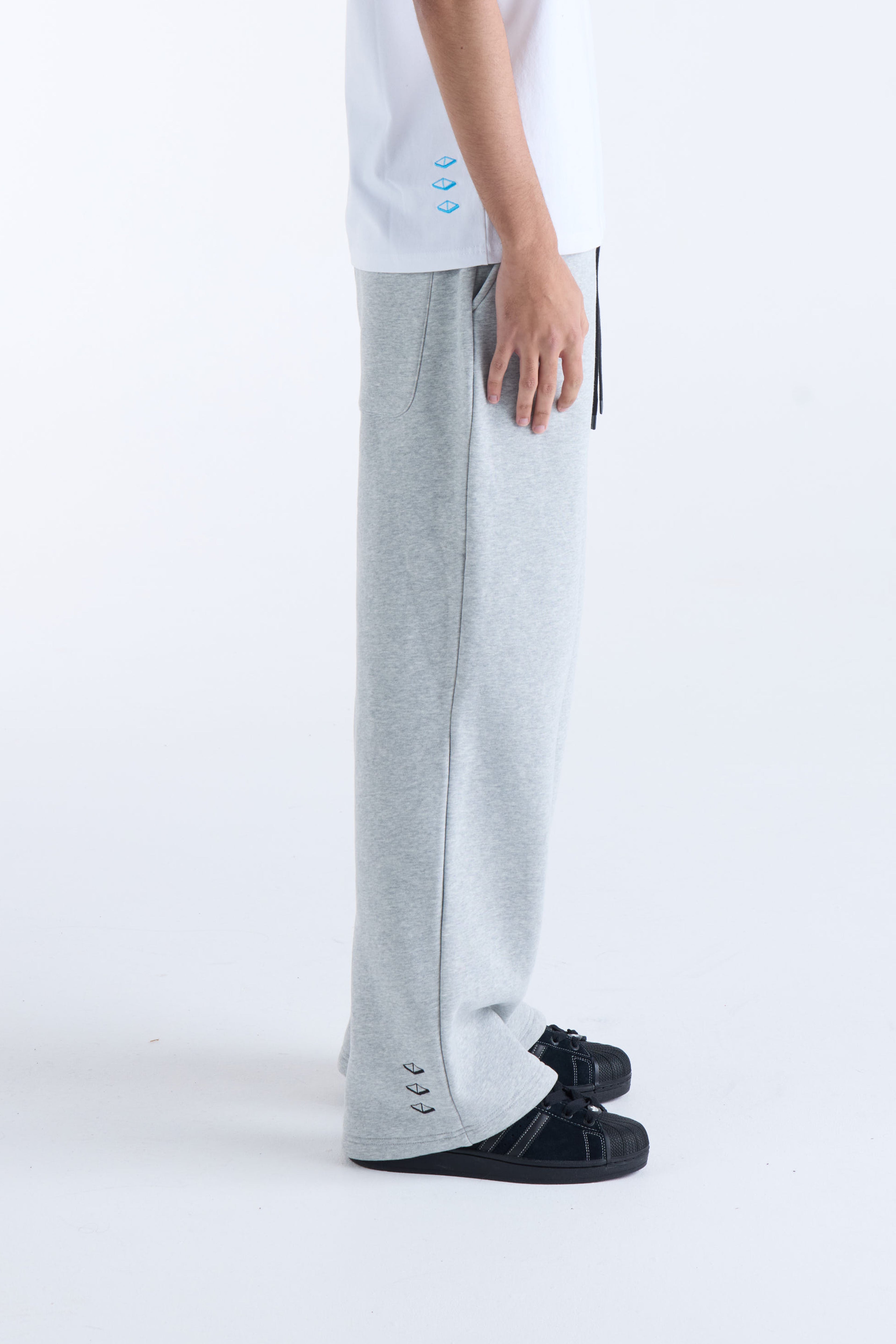 VOUSETI US AGAINST TIME TRACKPANTS