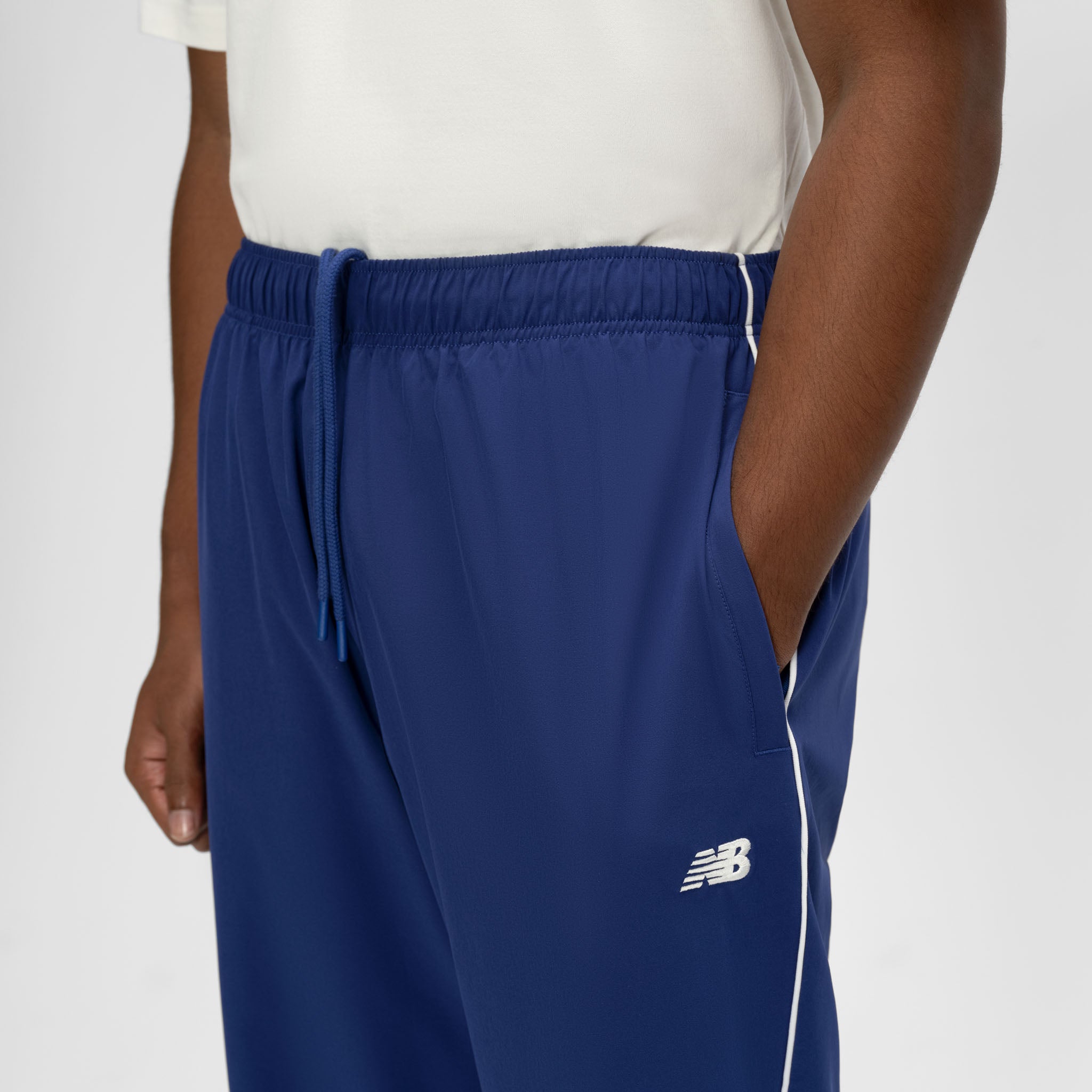 NEW BALANCE BASKETBALL WOVEN PANT
