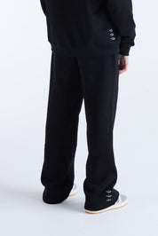 VOUSETI US AGAINST TIME TRACKPANTS
