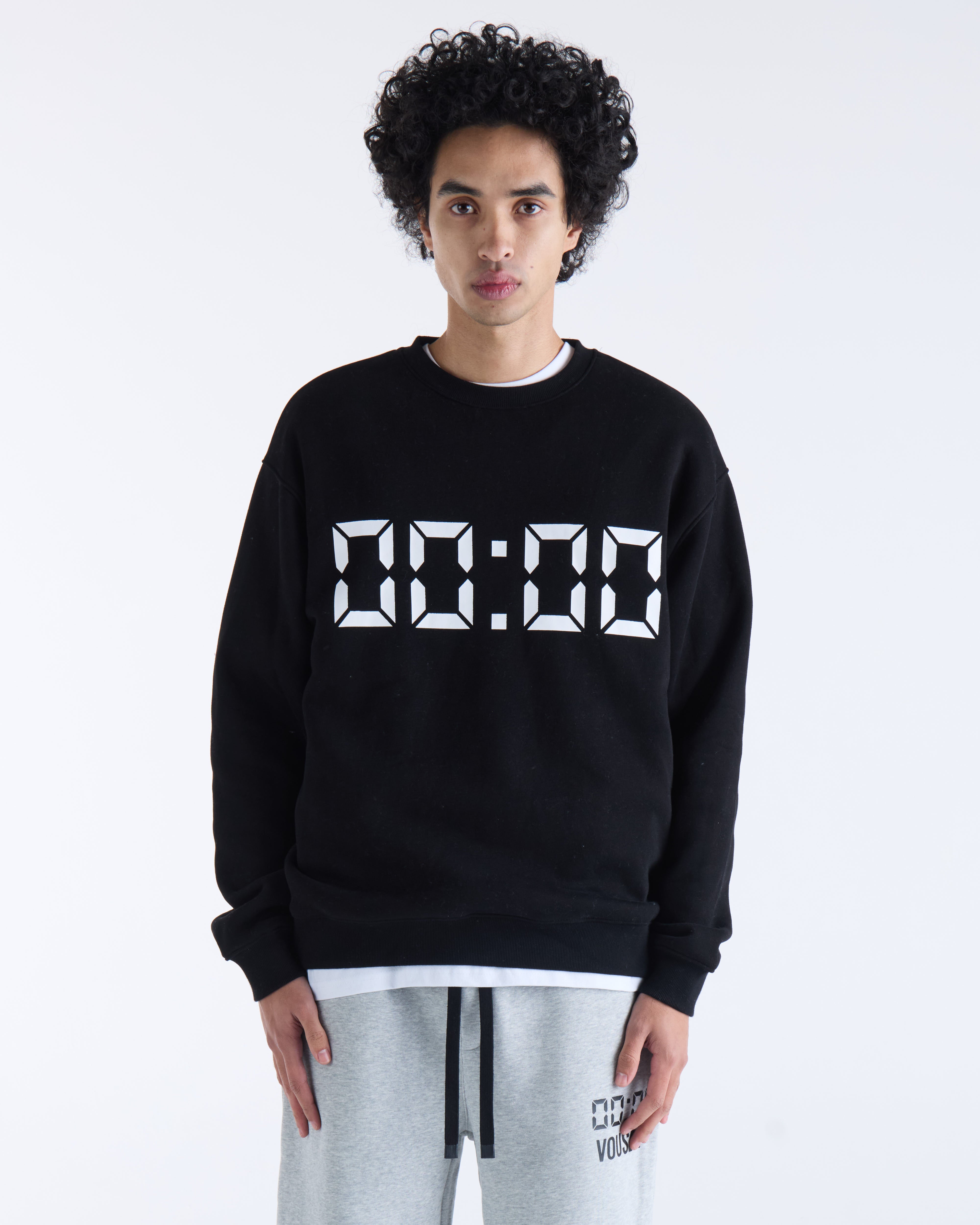 VOUSETI US AGAINST TIME SWEATER