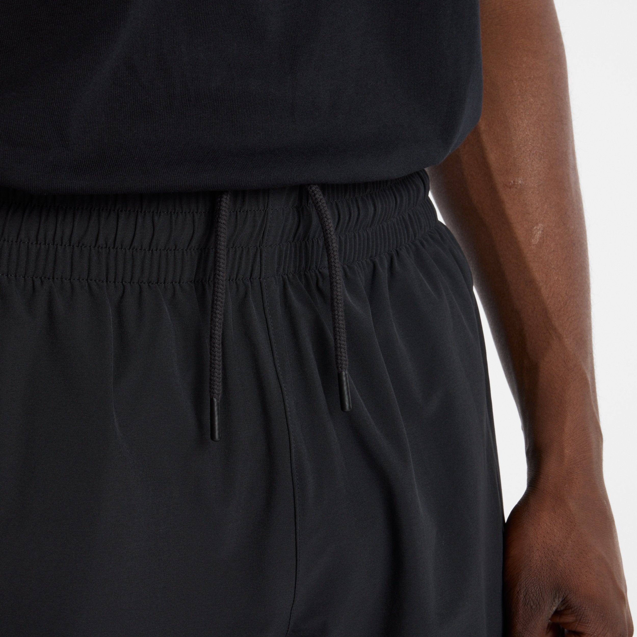 NEW BALANCE IN GAME WOVEN TRACK PANT