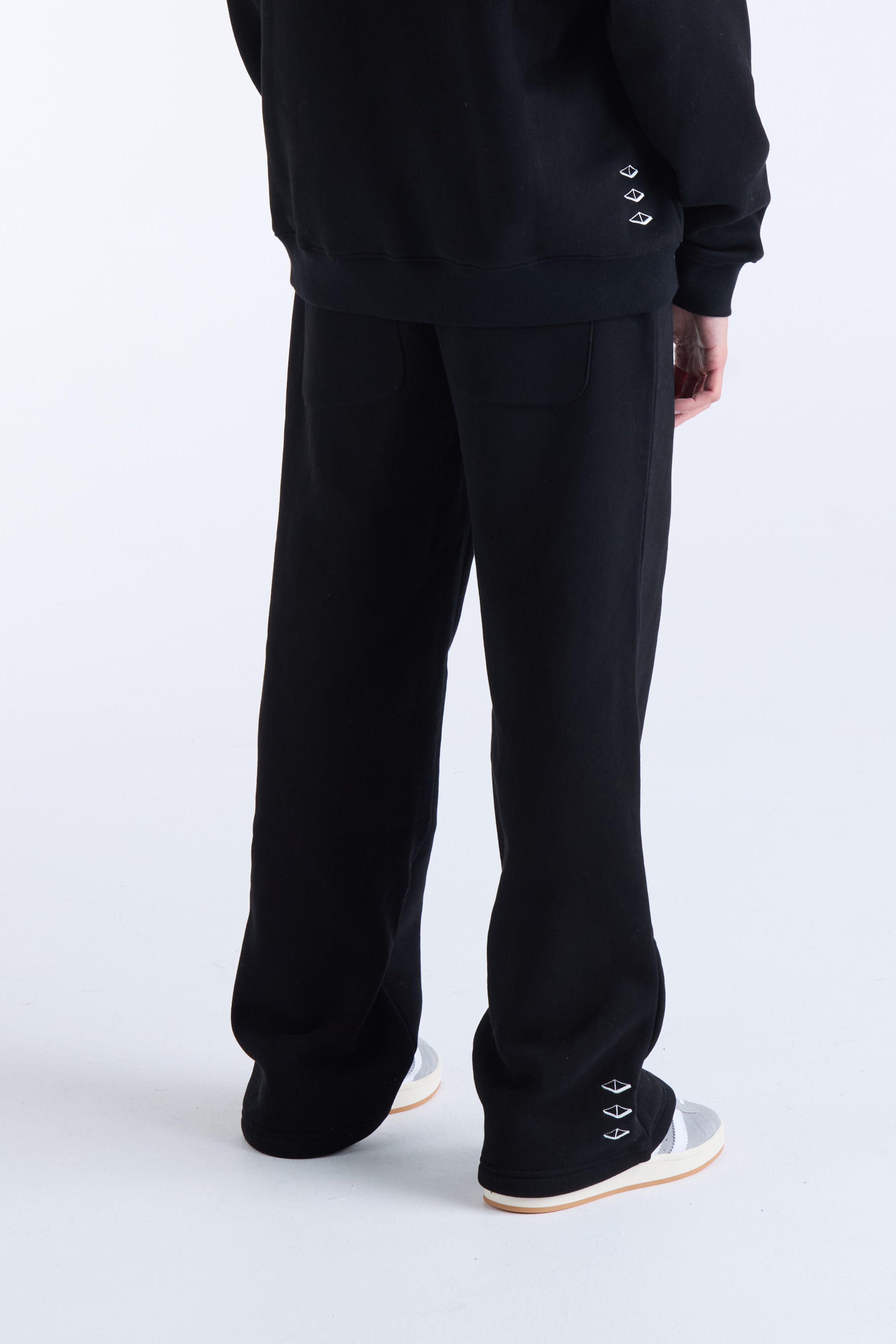 VOUSETI US AGAINST TIME TRACKPANTS
