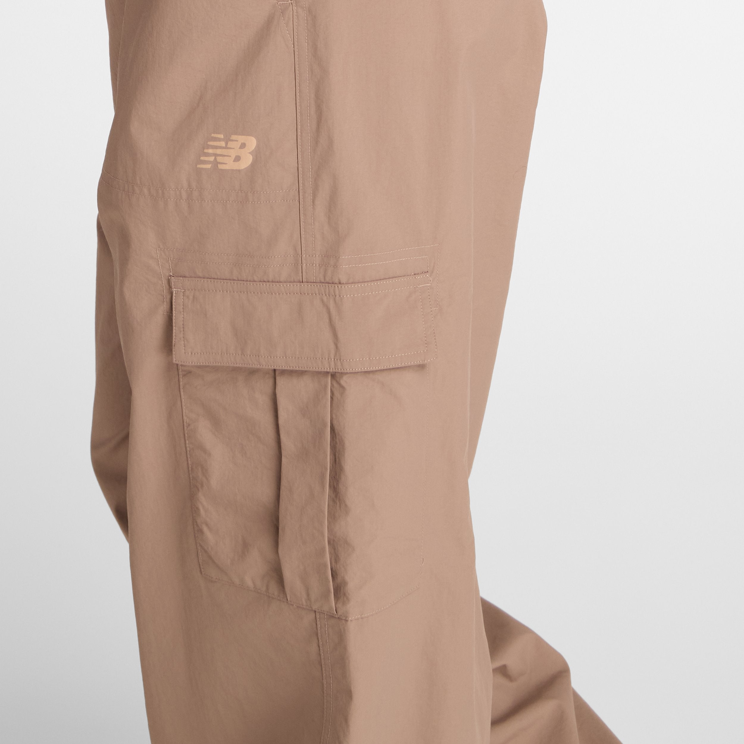 NEW BALANCE WOVEN CARGO PANT-EAS
