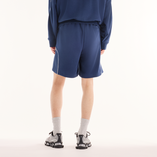 NEW BALANCE TRACKSIDE FRENCH TERRY 7" SHORT