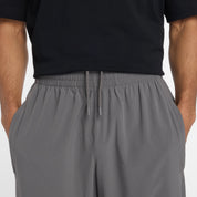 NEW BALANCE IN GAME WOVEN TRACK PANT-CAS