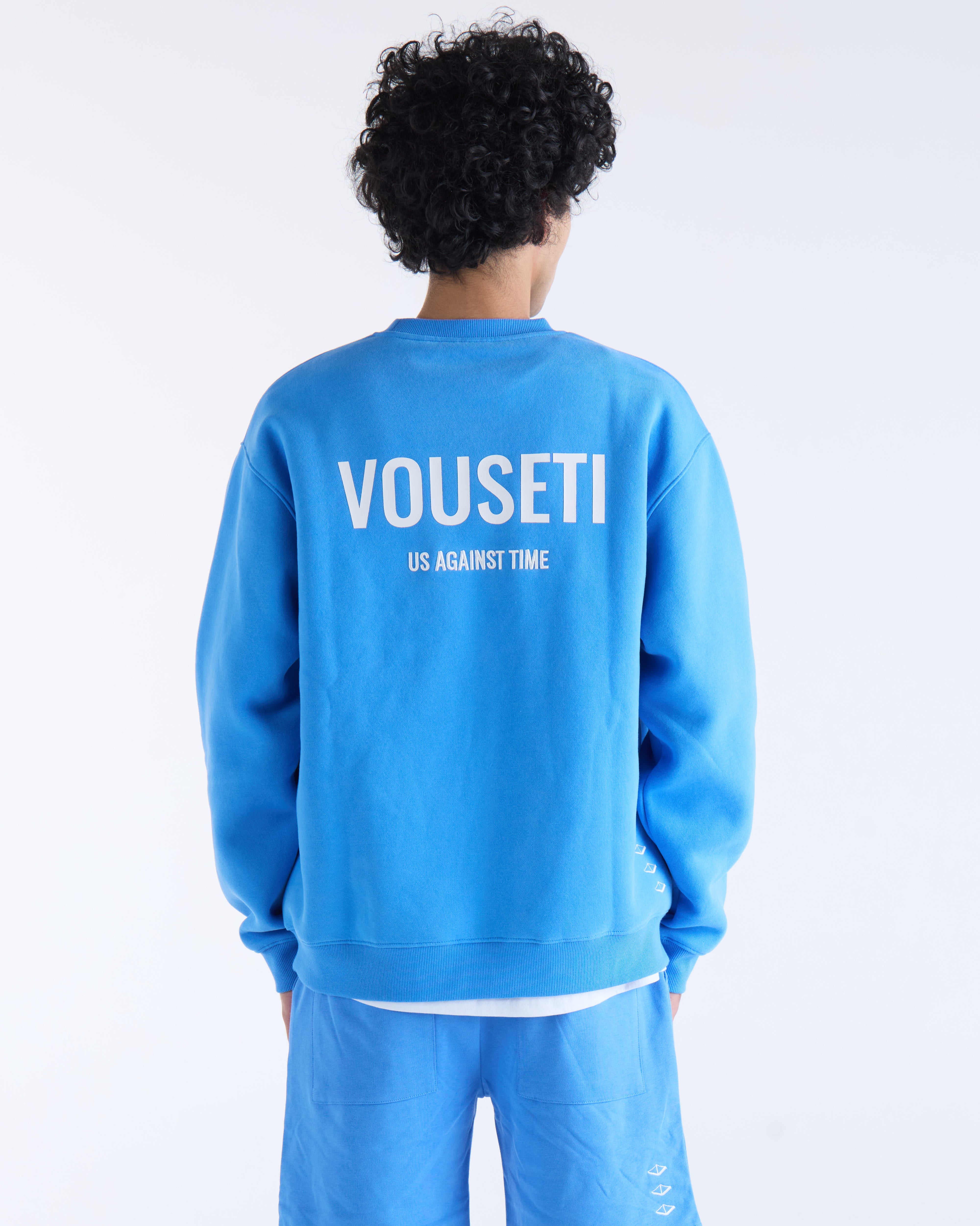VOUSETI US AGAINST TIME SWEATER