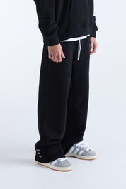 VOUSETI US AGAINST TIME TRACKPANTS