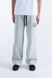 VOUSETI US AGAINST TIME TRACKPANTS