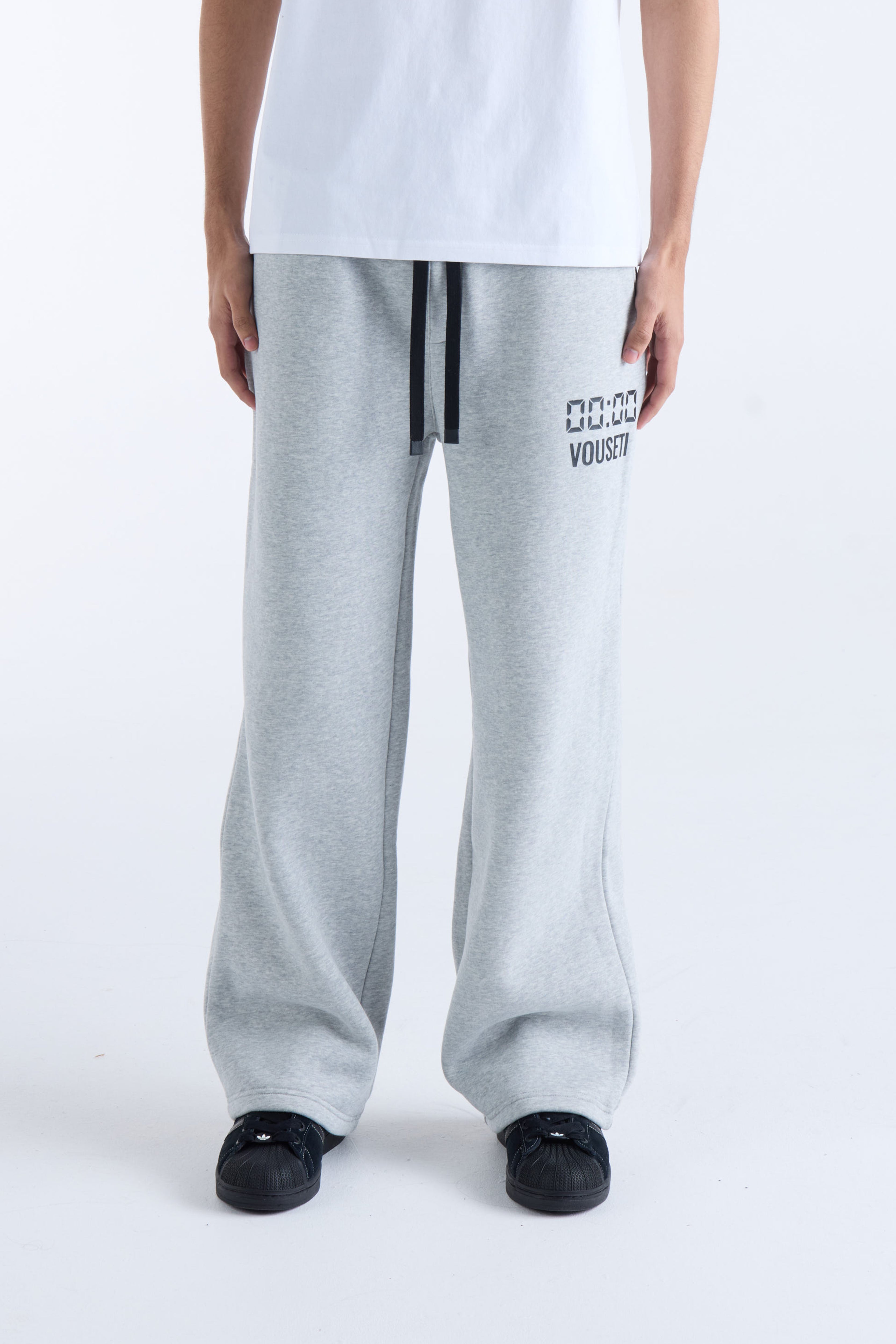 VOUSETI US AGAINST TIME TRACKPANTS