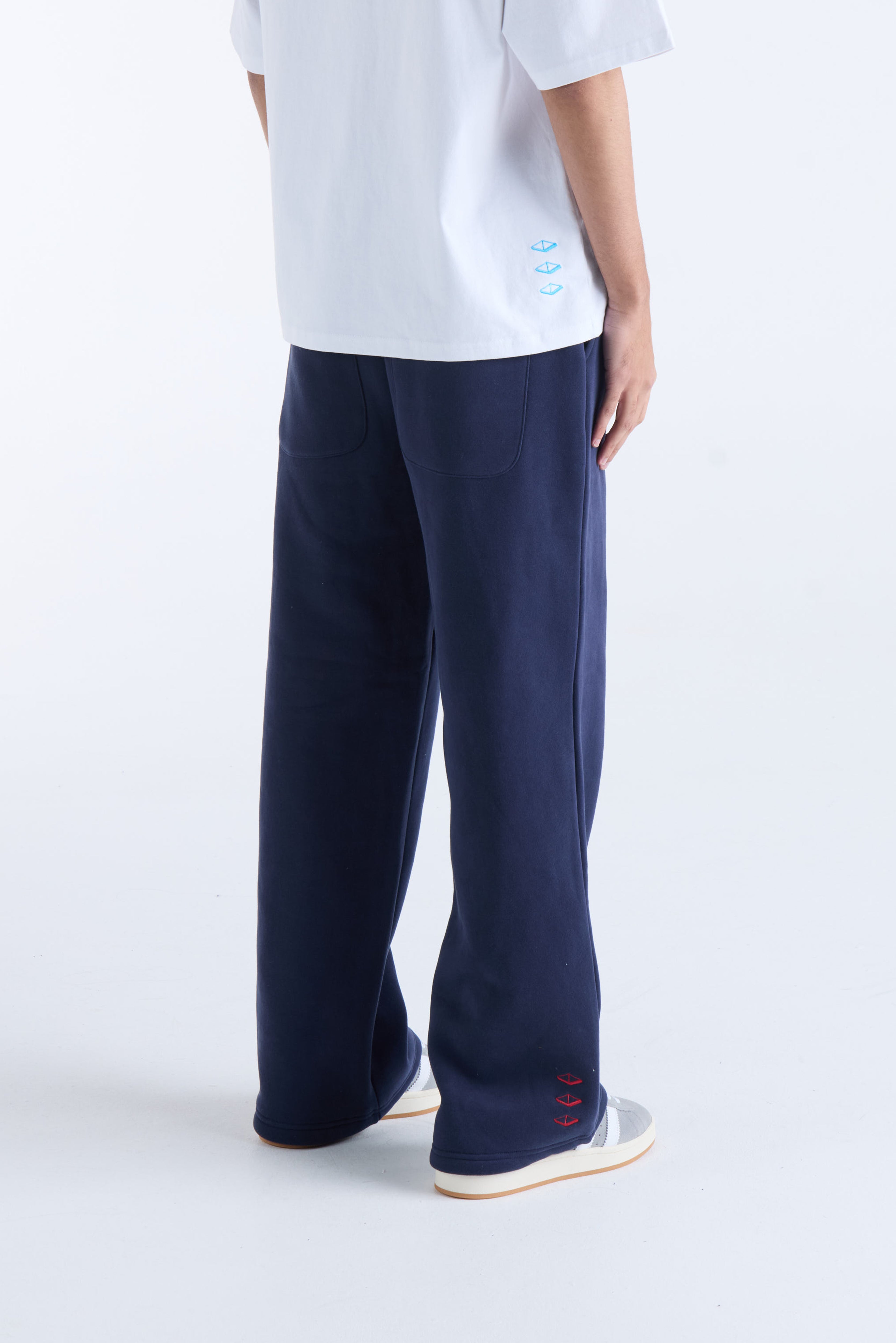 VOUSETI US AGAINST TIME TRACKPANTS