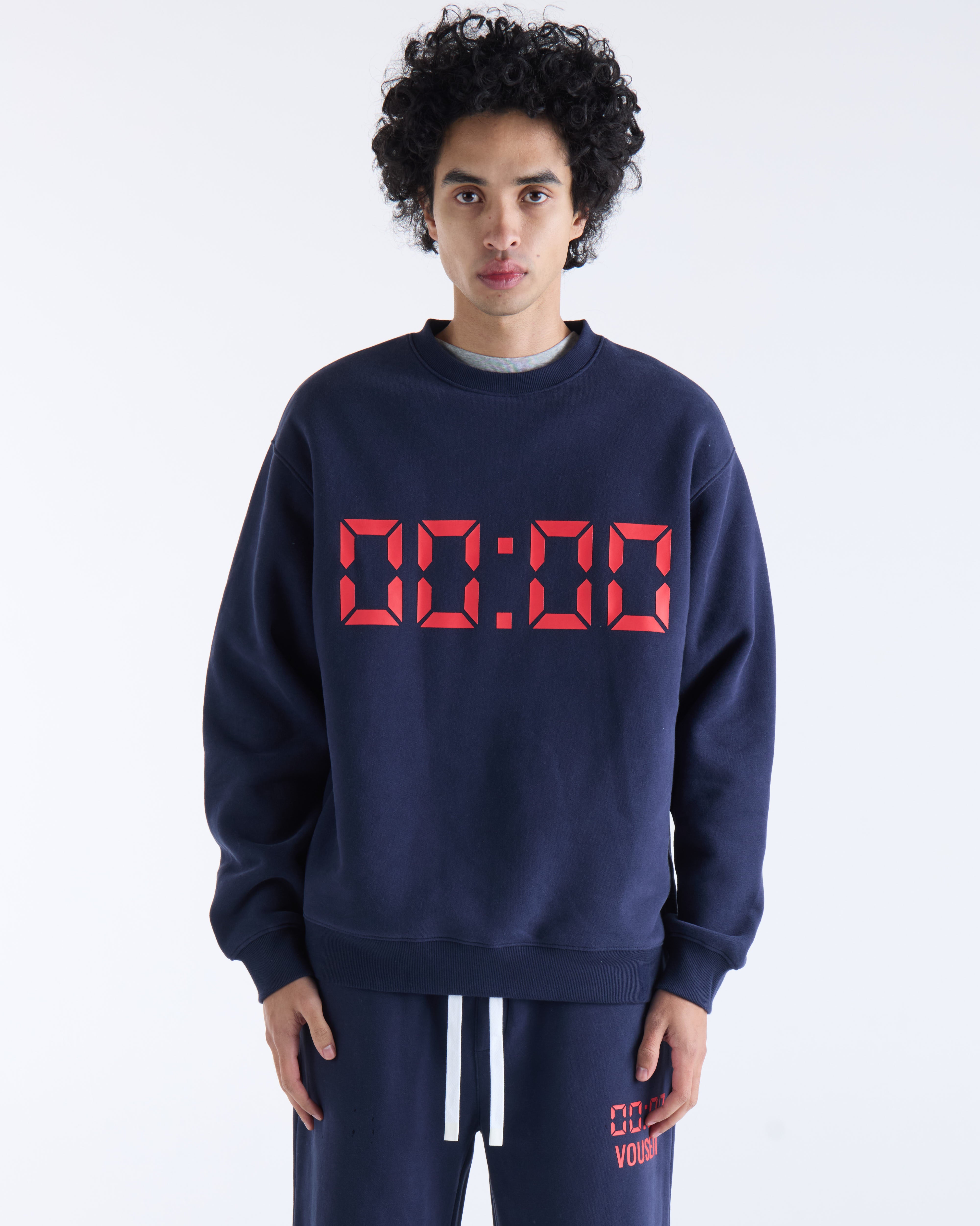 VOUSETI US AGAINST TIME SWEATER