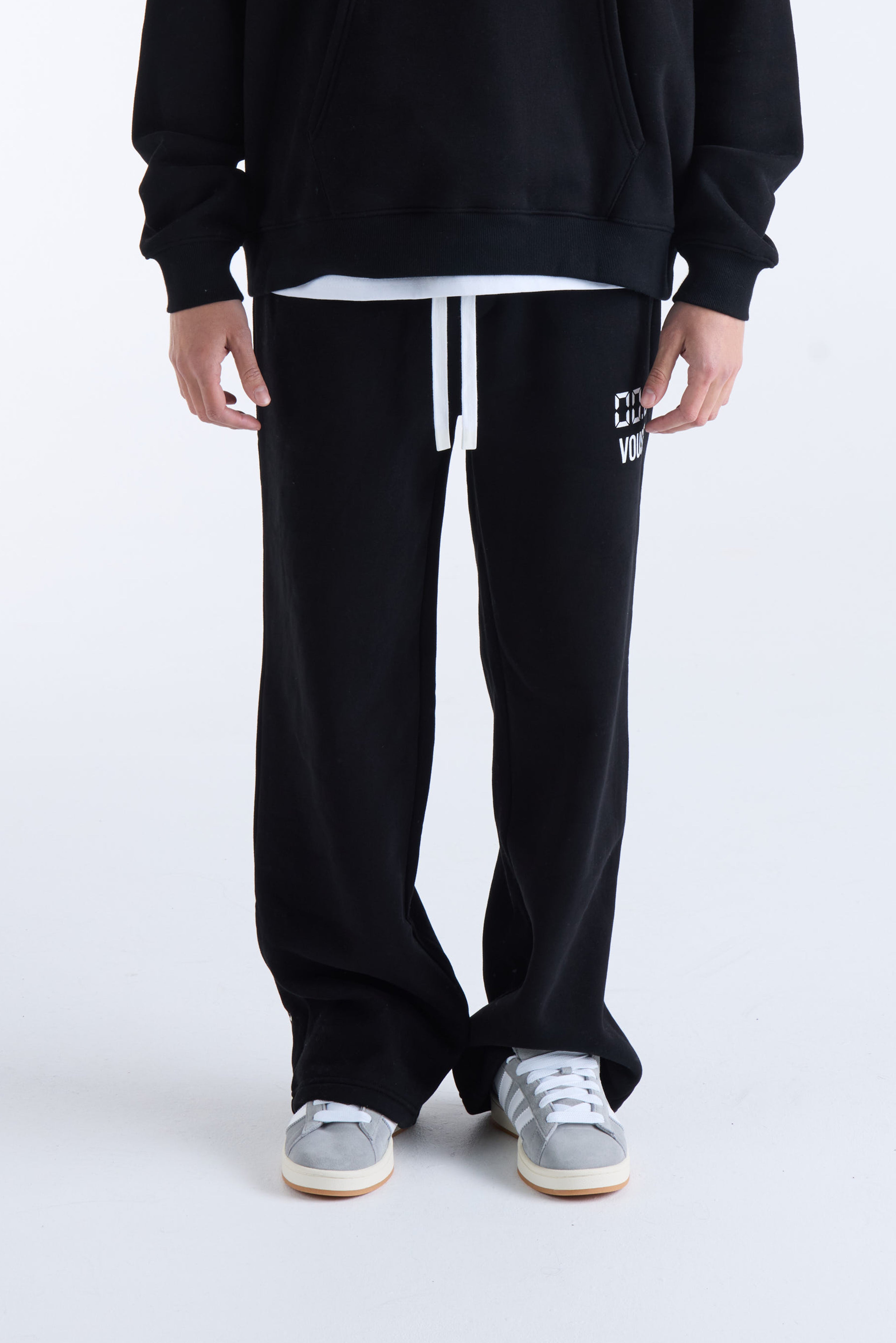 VOUSETI US AGAINST TIME TRACKPANTS