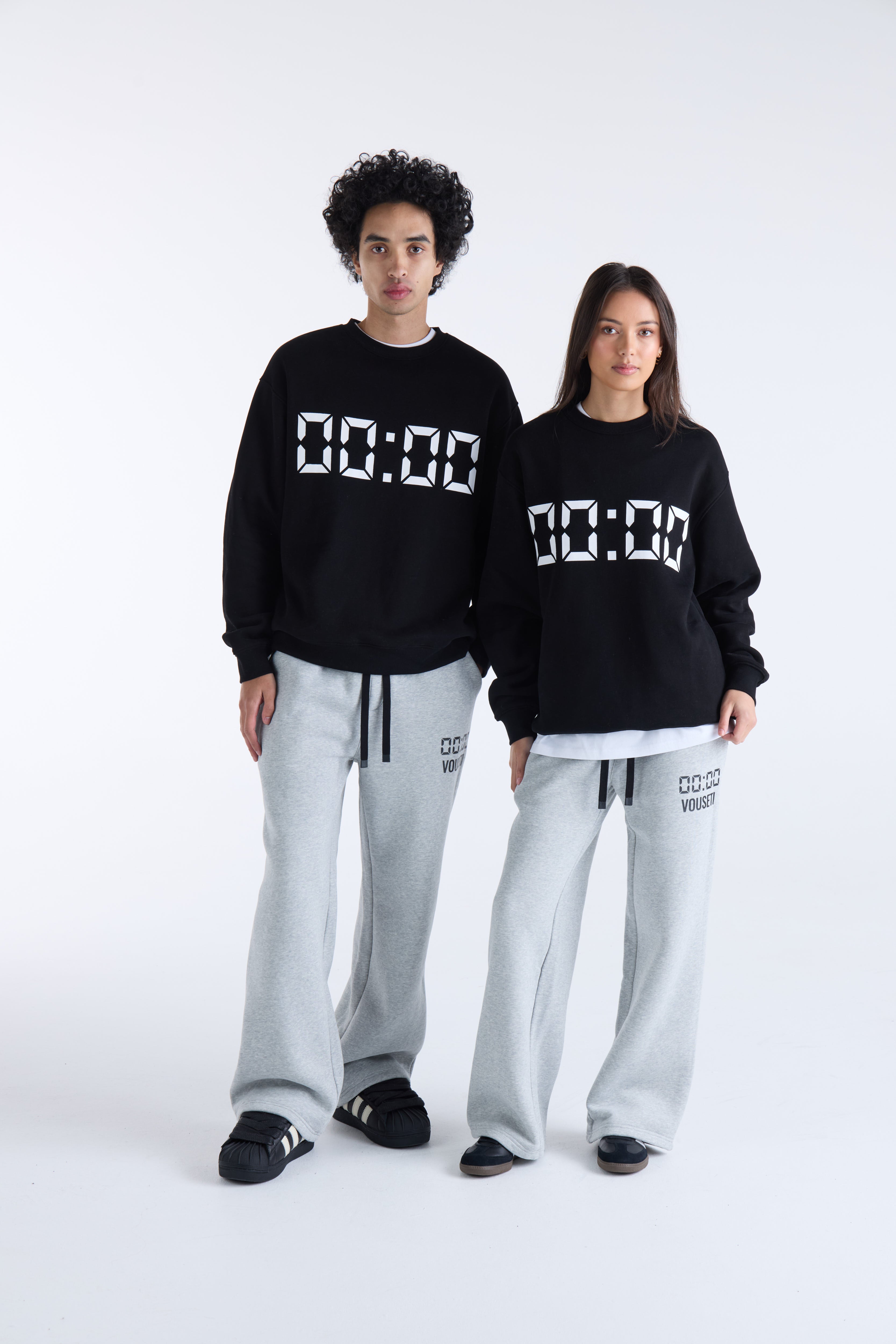 VOUSETI US AGAINST TIME SWEATER