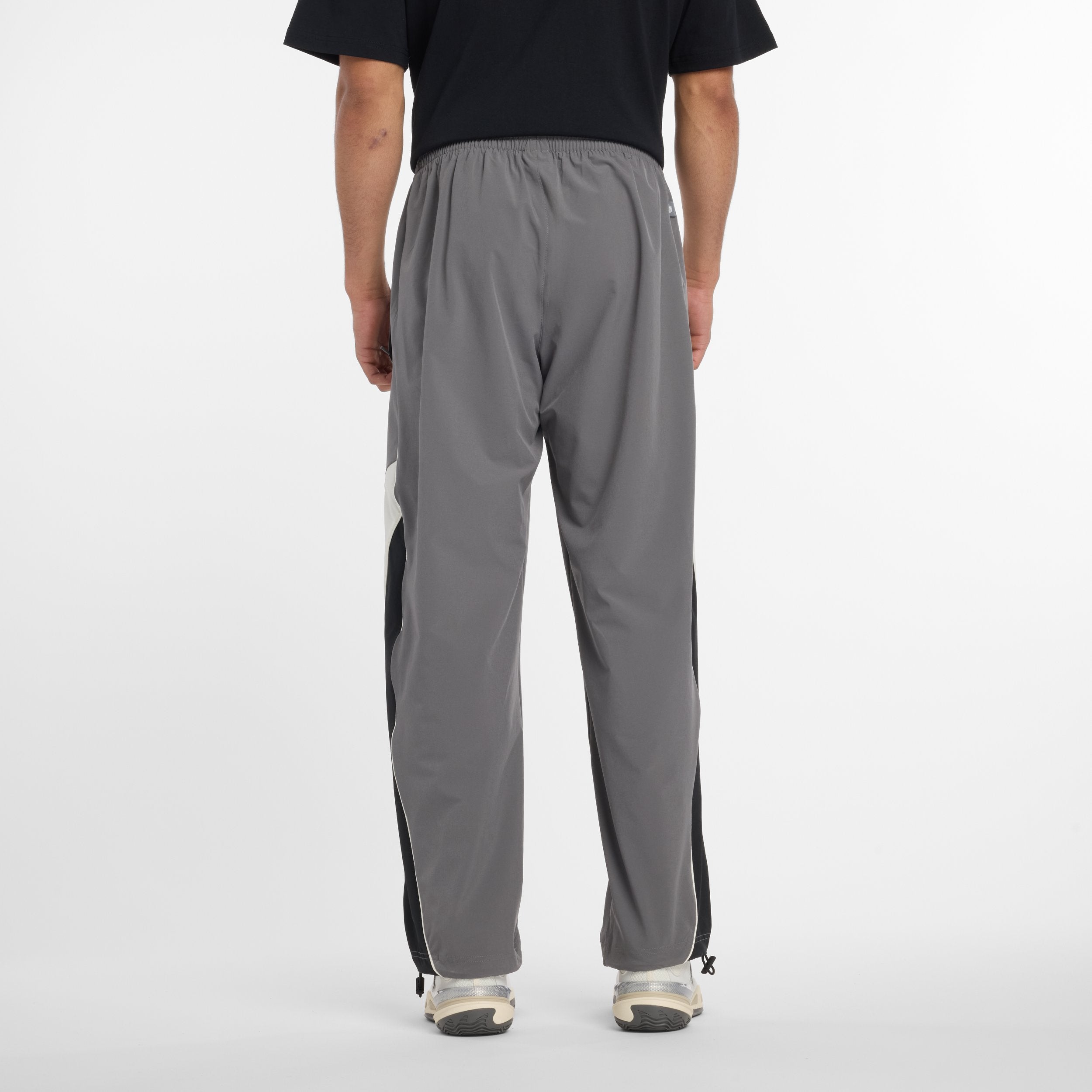 NEW BALANCE IN GAME WOVEN TRACK PANT-CAS