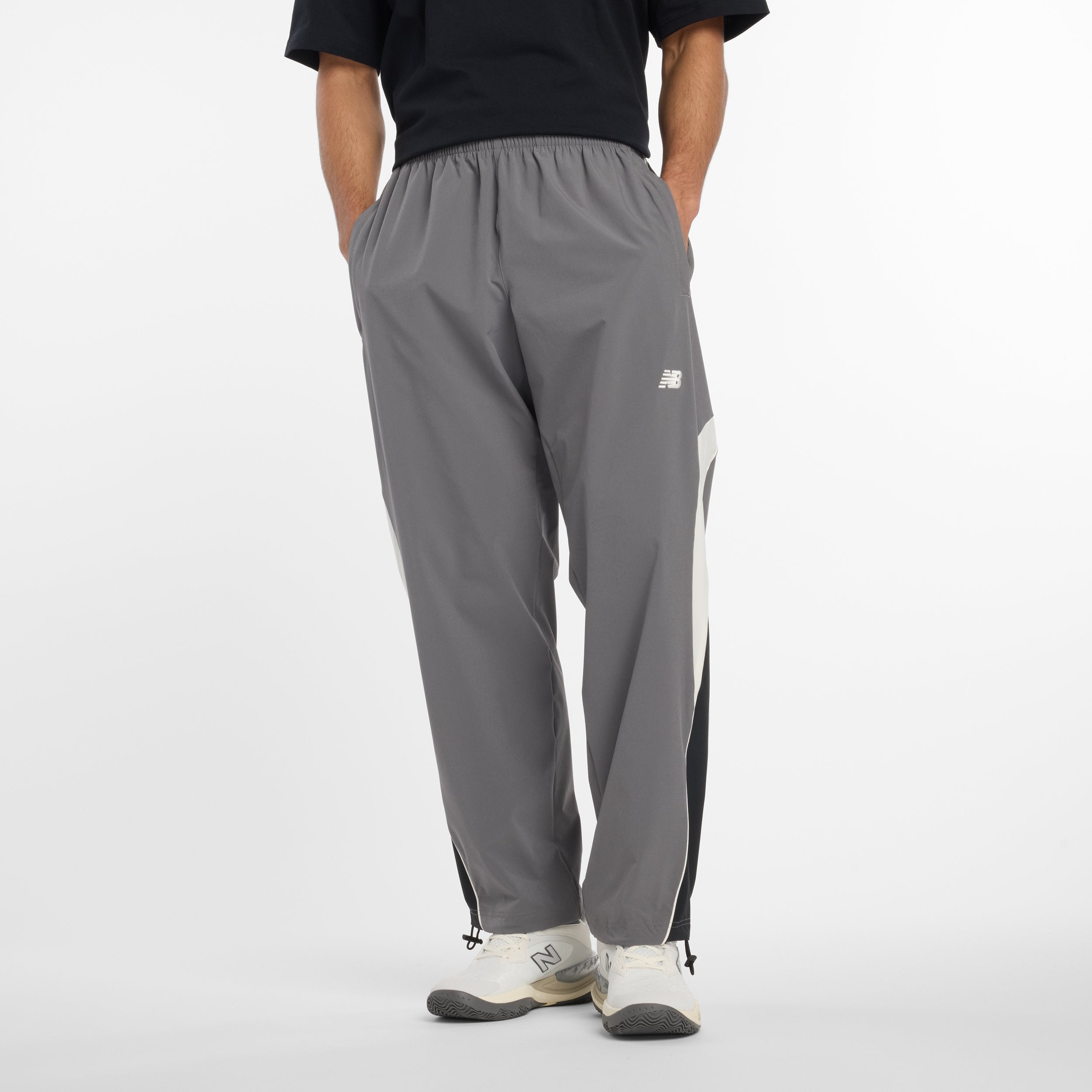 NEW BALANCE IN GAME WOVEN TRACK PANT-CAS