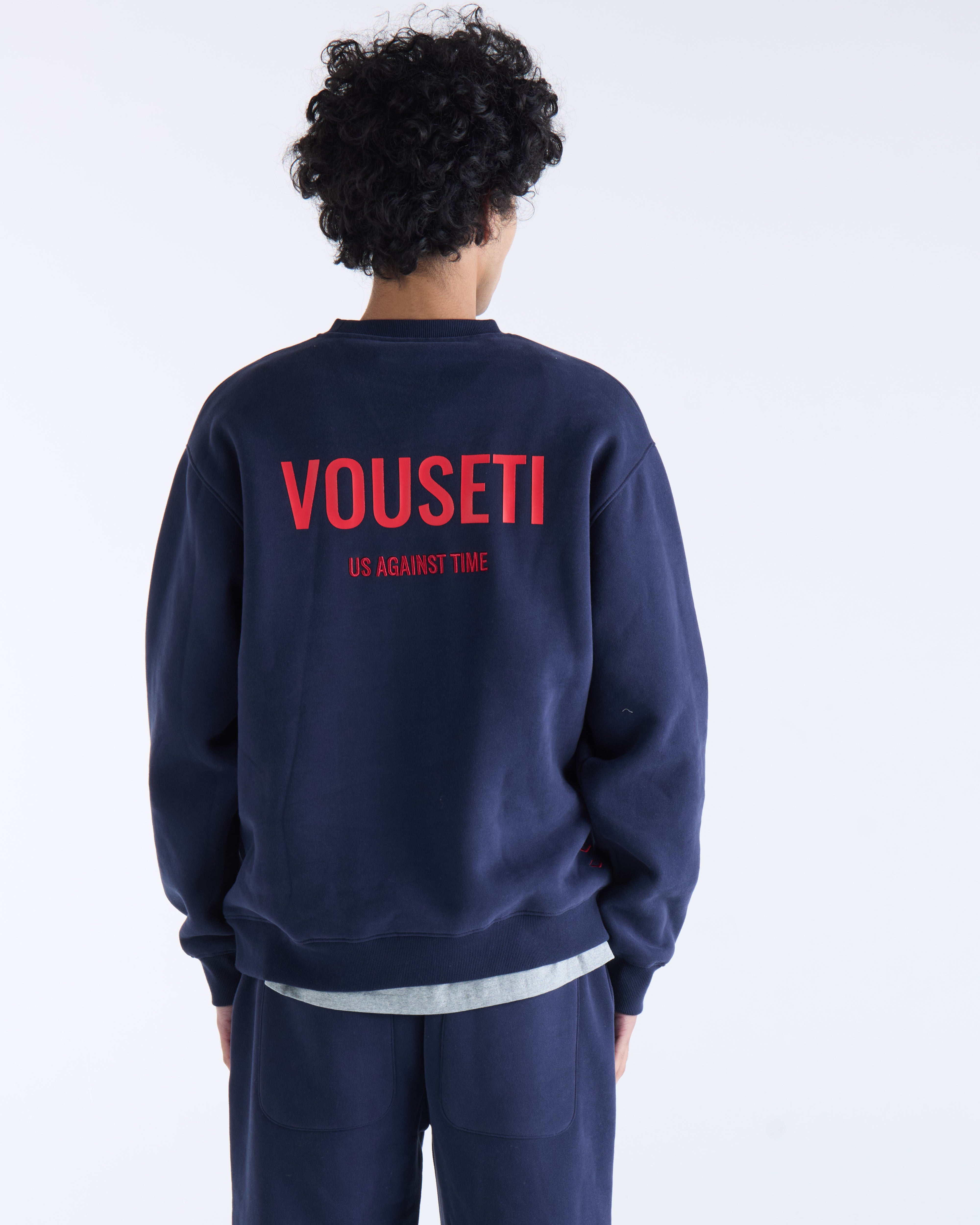 VOUSETI US AGAINST TIME SWEATER