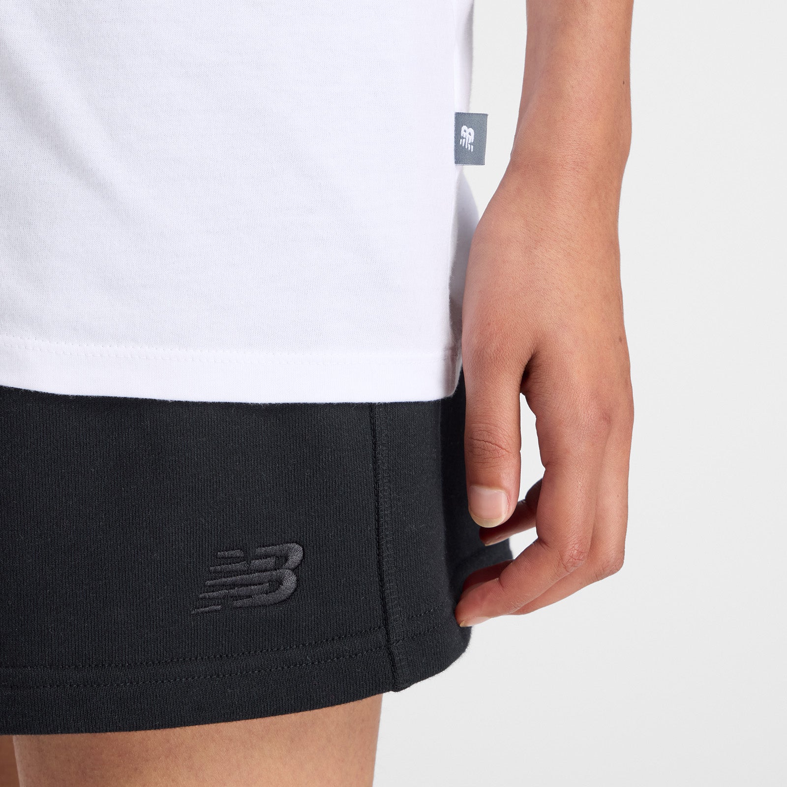 NEW BALANCE WOMENS TRACKSIDE OVERSIZED T-SHIRT